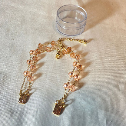 PULSEIRA ESCAPULARIO CRISTAL ROSA TRANSPARENTE (3 UNIDADES)