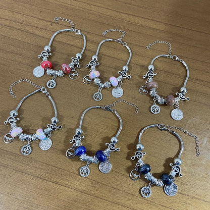PULSEIRA PRATEADA MEDALHA SÃO BENTO COM BERLOQUES  (6 UNIDADES)