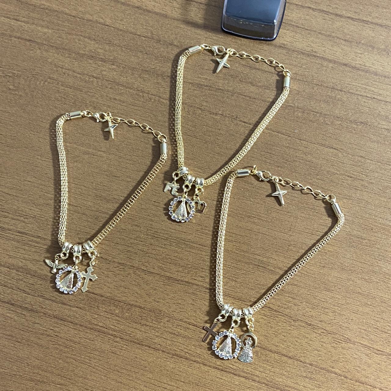 PULSEIRA DOURADA NOSSA SENHORA APARECIDA MODELOS SORTIDOS COM STRASS (6 UNIDADES)