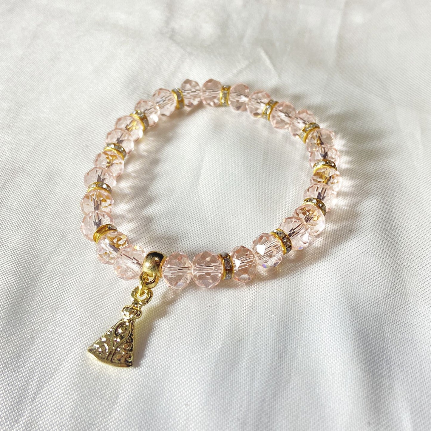 PULSEIRA CRISTAL ROSA TRANSPARENTE NOSSA SENHORA APARECIDA  (06 UNIDADES)