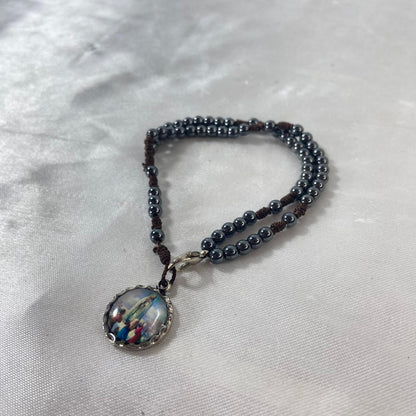 TERÇO PULSEIRA HEMATITA NOSSA SENHORA DE FÁTIMA 4MM (6 UNIDADES)