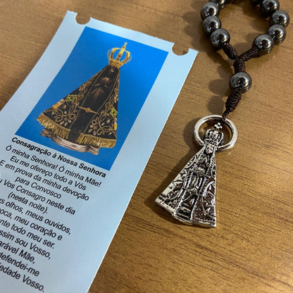 CHAVEIRO DEZENA HEMATITA COM MOSQUETE NOSSA SENHORA APARECIDA (3 UNIDADES)