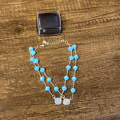 PULSEIRA ESCAPULÁRIO CRISTAL AZUL CLARO MEDALHA SÃO BENTO  (3 UNIDADES)