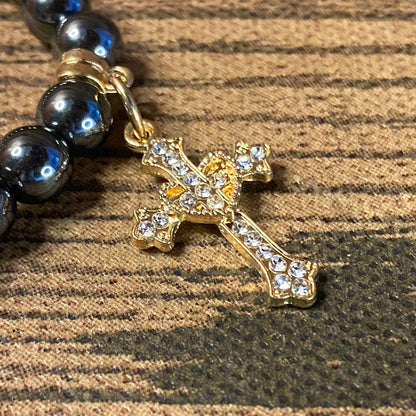PULSEIRA HEMATITA NOSSA SENHORA APARECIDA COM PINGENTE DE CRUZ  08MM (06 UNIDADES)