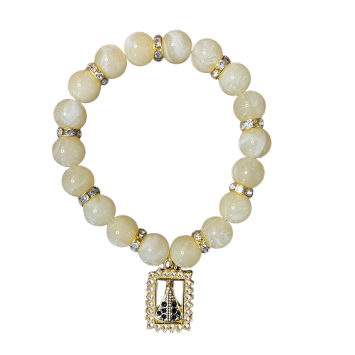 PULSEIRA PÉROLA BEGE COM PINGENTE NOSSA SENHORA APARECIDA COM STRASS 08MM  (03 UNIDADES)