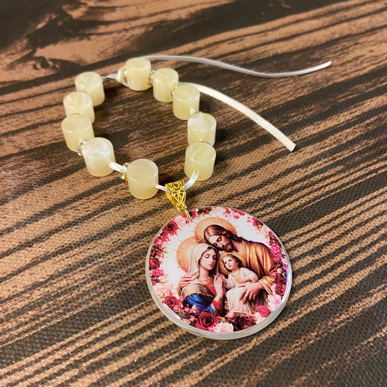 DEZENA PEDRARIAS MEDALHÃO RESINADO SAGRADA FAMÍLIA  12MM  (1 UNIDADE)