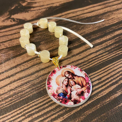 DEZENA PEDRARIAS MEDALHÃO RESINADO SAGRADA FAMÍLIA  12MM  (1 UNIDADE)