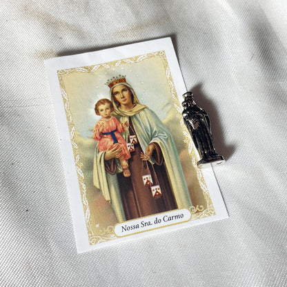SANTO CHUMBO DE BOLSO NOSSA SENHORA DO CARMO (12 UNIDADES)