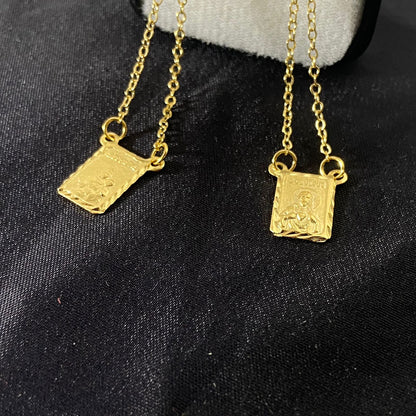 ESCAPULÁRIO DOURADO SAGRADO CORAÇÃO DE JESUS E NOSSA SENHORA DO CARMO M  (3 UNIDADES)