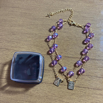 PULSEIRA ESCAPULARIO CRISTAL LILÁS  (3 UNIDADES)