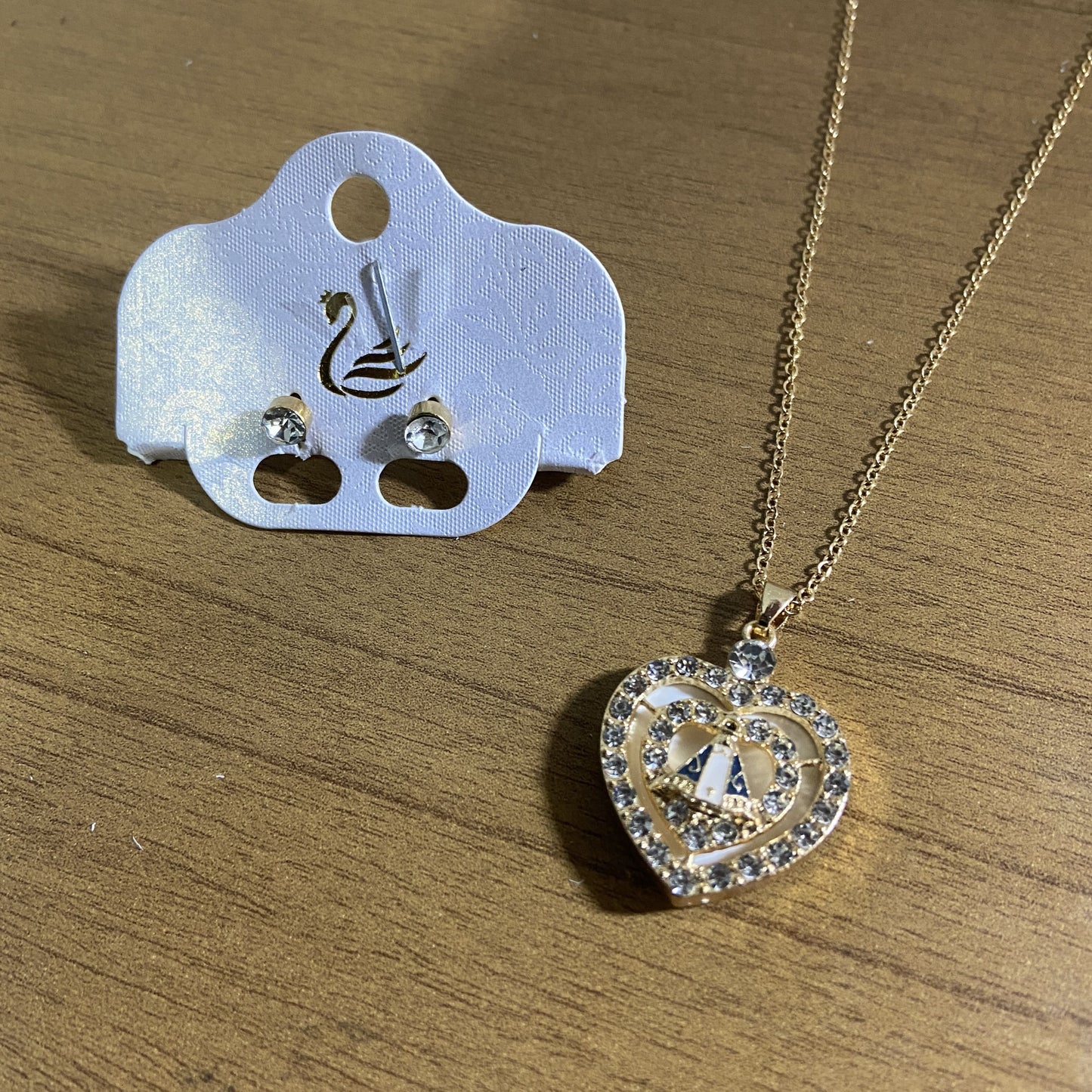 CORRENTE DOURADA COM BRINCO PONTA DE LUZ NOSSA SENHORA APARECIDA MOD 07  ( 1 UNIDADE)