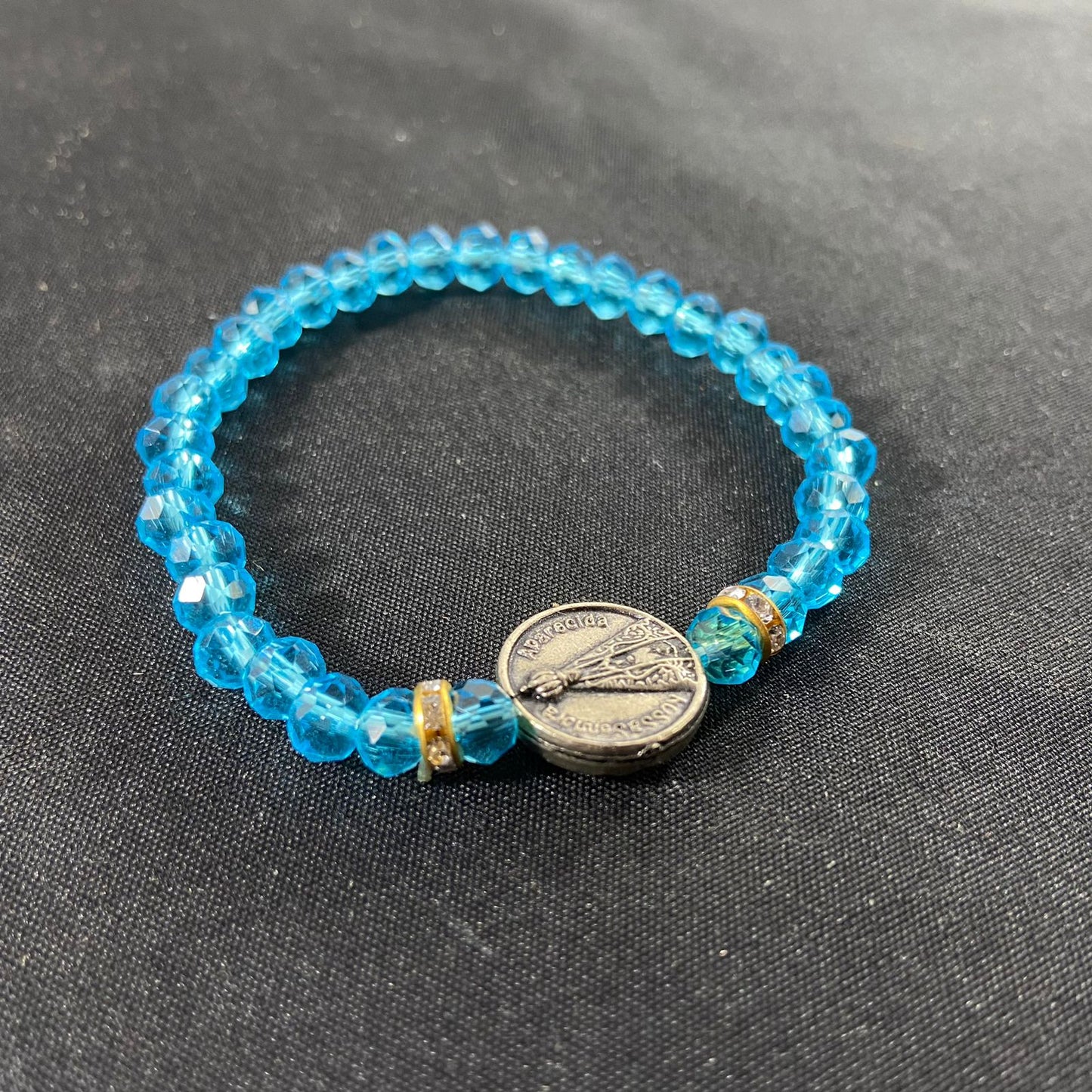 PULSEIRA CRISTAL NOSSA SENHORA APARECIDA AZUL CLARO MOD2 (6 UNIDADES)