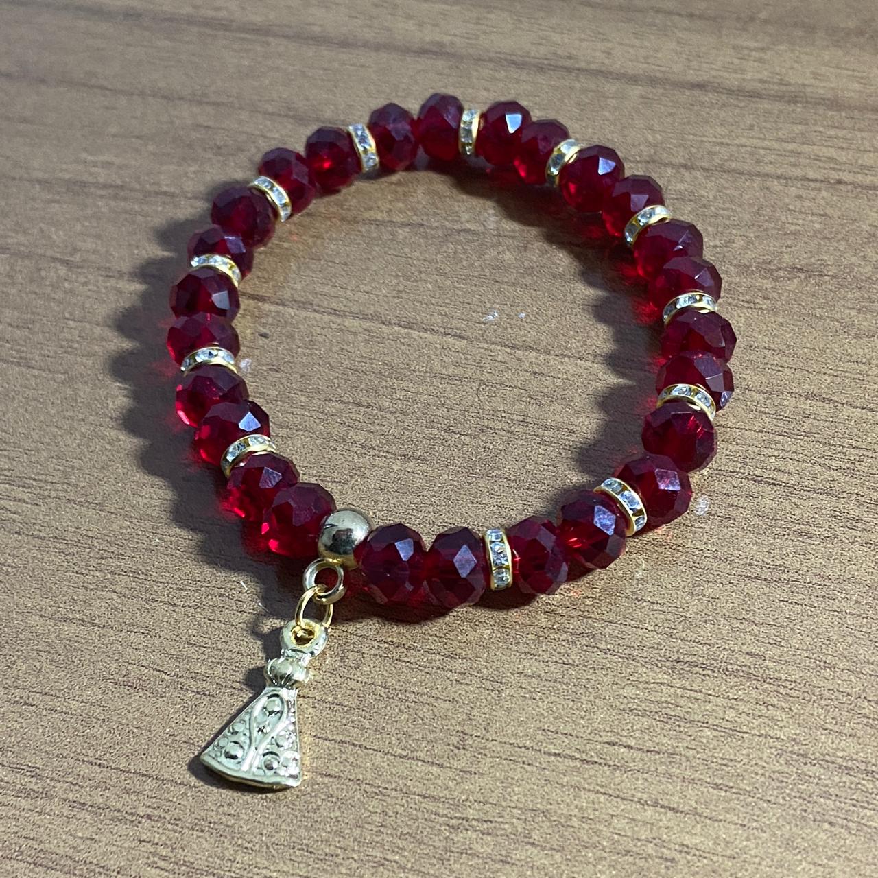PULSEIRA CRISTAL VERMELHA TRANSPARENTE NOSSA SENHORA APARECIDA  (06 UNIDADES)
