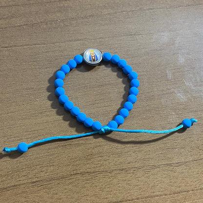 PULSEIRA AZUL REGULÁVEL COM MEDALHA RESINADA NOSSA SENHORA APARECIDA (6 UNIDADES)