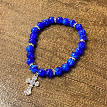 PULSEIRA PÉROLA AZUL CRUZ COM STRASS 08MM (03 UNIDADES)