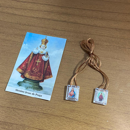 ESCAPULÁRIO CORDINHA SAGRADO CORAÇÃO DE JESUS E MENINO JESUS DE PRAGA (12 UNIDADES)