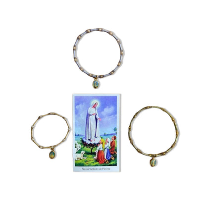 PULSEIRA DE MOLA COM MEDALHA NOSSA SENHORA DE FÁTIMA CORES SORTIDAS  (3 UNIDADES)