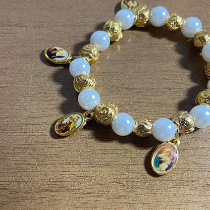 PULSEIRA DOURADA COM PÉROLA TODOS OS SANTOS  (01 UNIDADE)