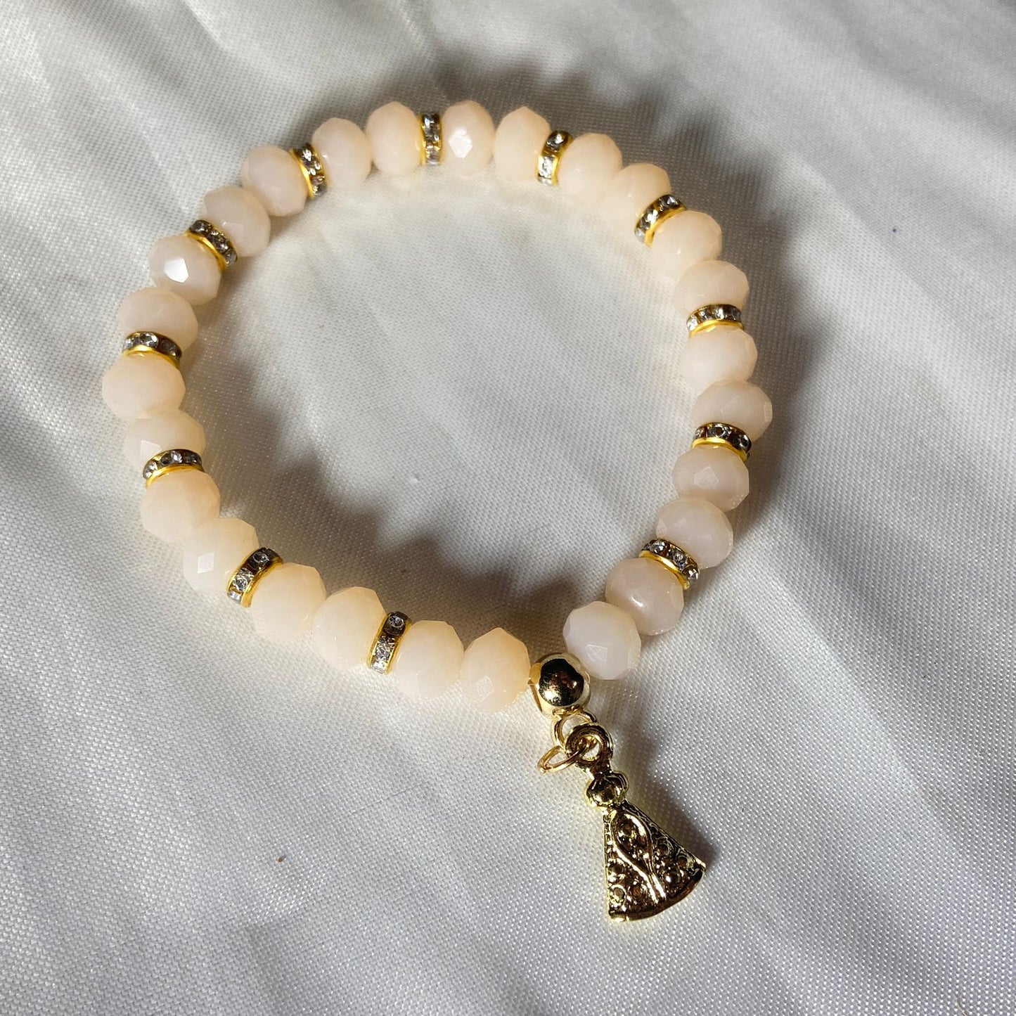 PULSEIRA CRISTAL CREME NOSSA SENHORA APARECIDA  (06 UNIDADES)