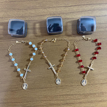 PULSEIRA CRISTAL CRUZ COM PINGENTE NOSSA SENHORA APARECIDA CORES SORTIDAS  (03 UNIDADES)