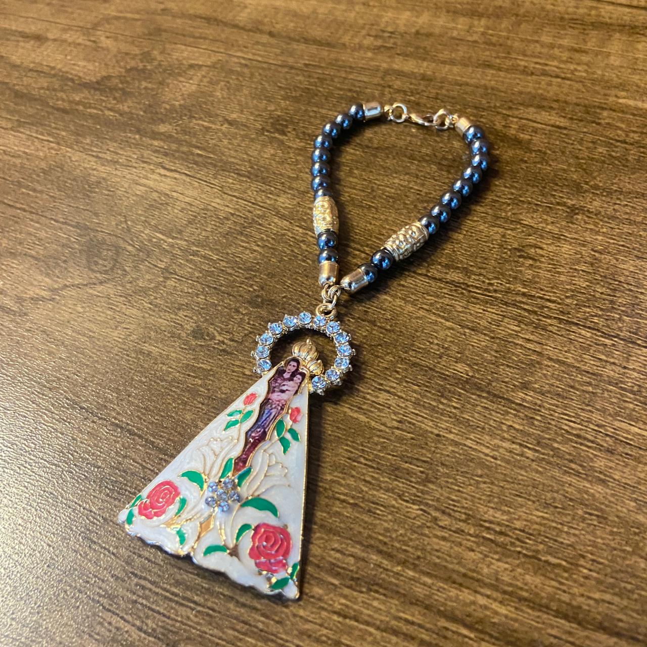 DEZENA PARA CARRO HEMATITA NOSSA SENHORA DE NAZARÉ COM STRASS 06MM (3 UNIDADES)