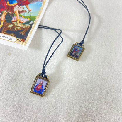 ESCAPULÁRIO DE COURO SÃO MIGUEL (12 UNIDADES)