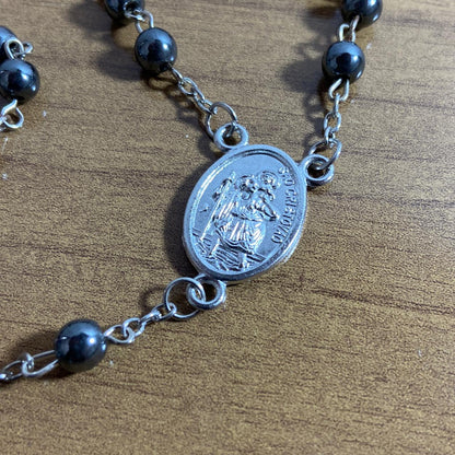 TERÇO HEMATITA NOSSA SENHORA APARECIDA E SÃO CRISTOVÃO 6MM (6 UNIDADES)