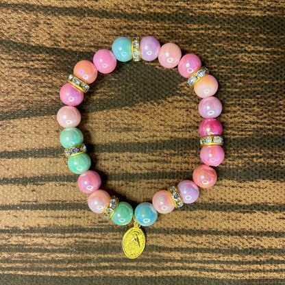 PULSEIRA PÉROLA INFANTIL COM PINGENTE NOSSA SENHORA DAS GRAÇAS (03 UNIDADES)