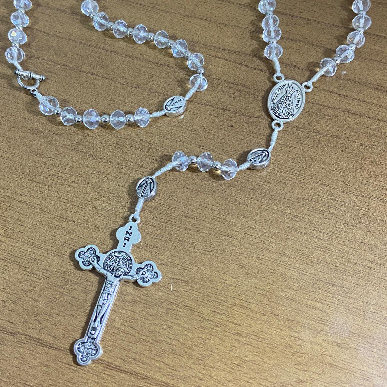 TERÇO CRISTAL NOSSA SENHORA APARECIDA  E SÃO CRISTÓVÃO 6 MM TRANSPARENTE  (1 UNIDADE)