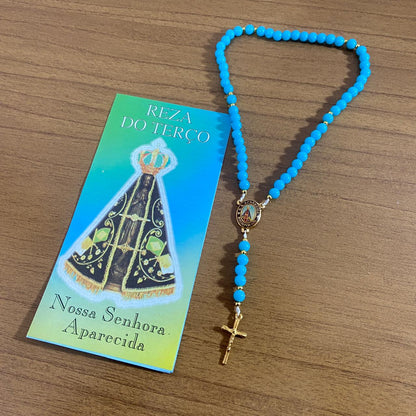 TERÇO PÉROLA AZUL NOSSA SENHORA APARECIDA 6MM (1 UNIDADE)