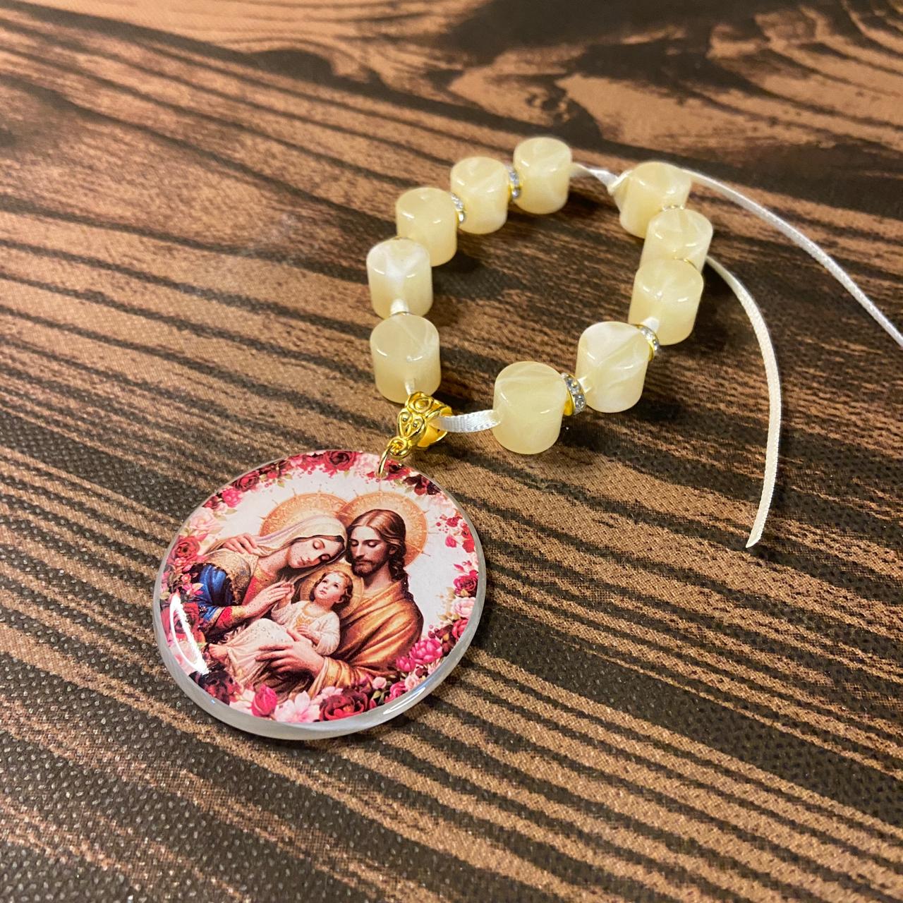 DEZENA PEDRARIAS MEDALHÃO RESINADO SAGRADA FAMÍLIA  12MM  (1 UNIDADE)