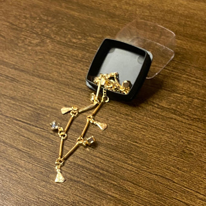 PULSEIRA DOURADA PINGENTES DE NOSSA SENHORA APARECIDA E PONTO DE LUZ  (3 UNIDADES)