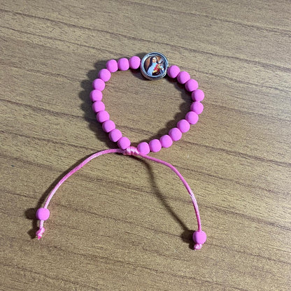 PULSEIRA EMBORRACHADA SANTA TERESINHA ROSA REGULÁVEL (6 UNIDADES)
