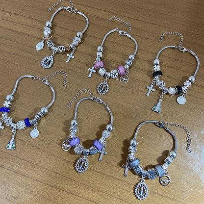 PULSEIRA PRATEADA NOSSA SENHORA APARECIDA MODELOS SORTIDOS COM BERLOQUES  (6 UNIDADES)