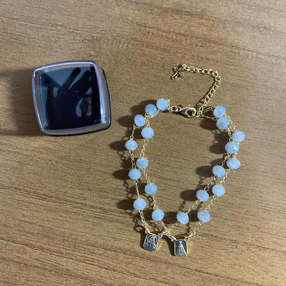 PULSEIRA ESCAPULARIO CRISTAL CINZA (3 UNIDADES)