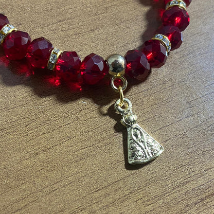 PULSEIRA CRISTAL VERMELHA TRANSPARENTE NOSSA SENHORA APARECIDA  (06 UNIDADES)