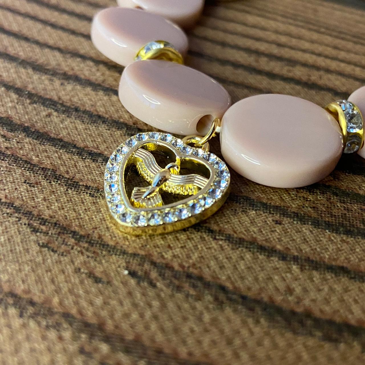 PULSEIRA ACRÍLICA ROSÉ COM MEDALHA DIVINO ESPÍRITO SANTO COM STRASS (03 UNIDADES)