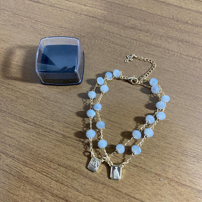 PULSEIRA ESCAPULARIO CRISTAL CINZA (3 UNIDADES)