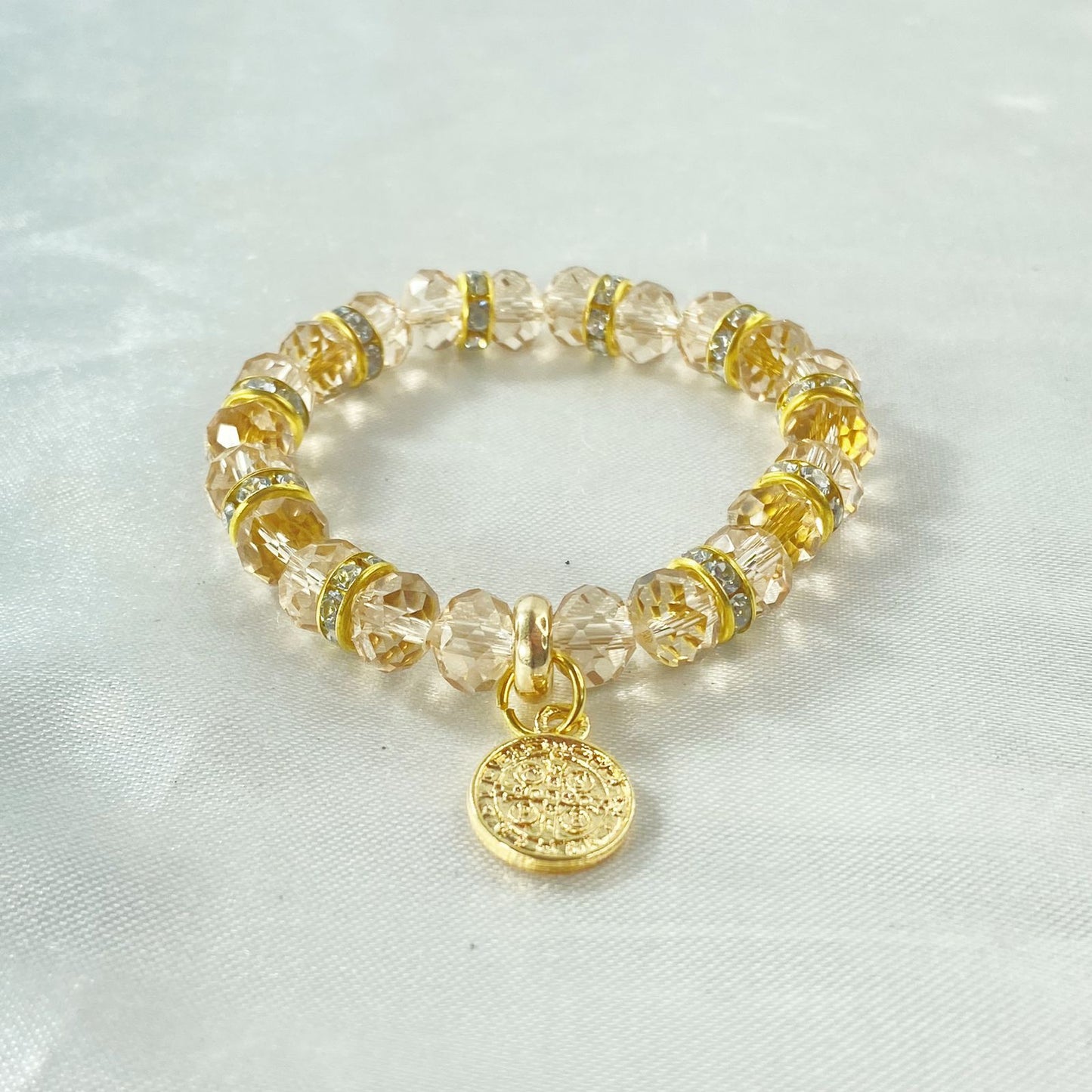 PULSEIRA CRISTAL MEDALHA SÃO BENTO CREME ( 3 UNIDADES)