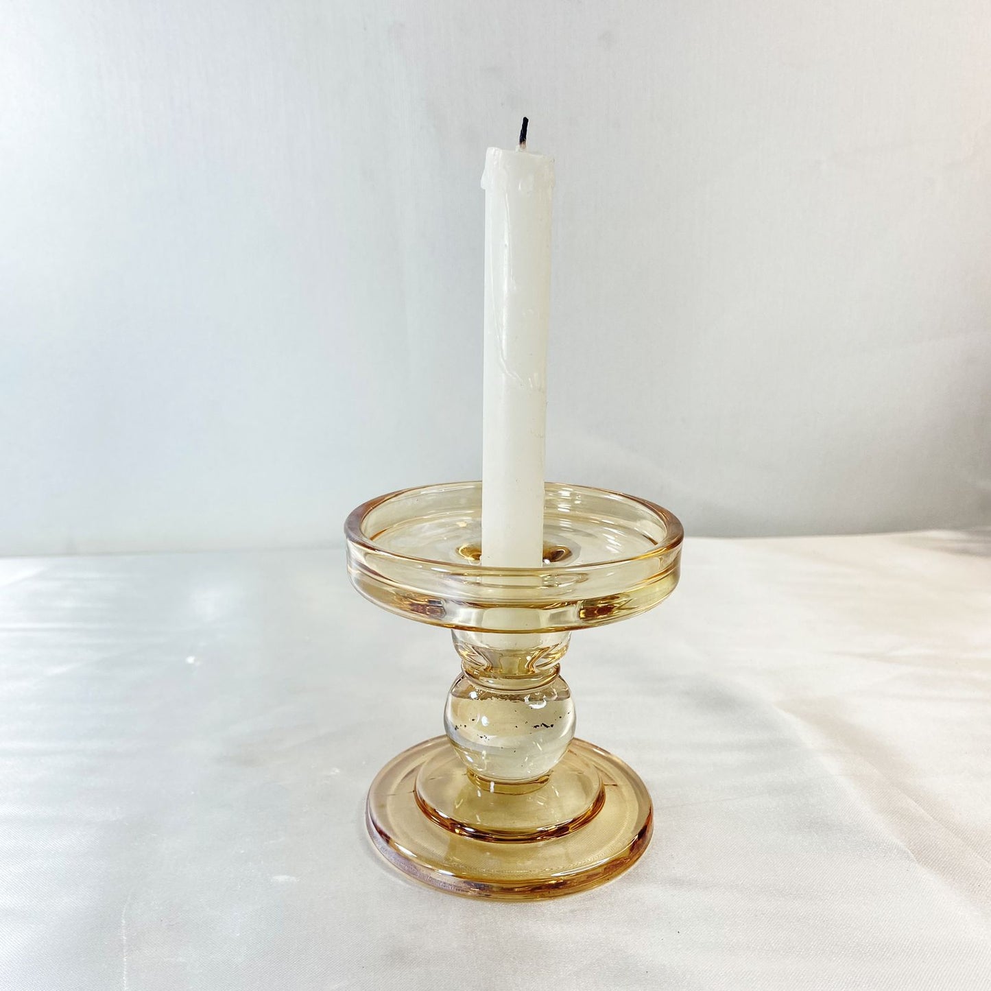 CASTIÇAL DE VIDRO BEGE 8,5CM (1 UNIDADE)