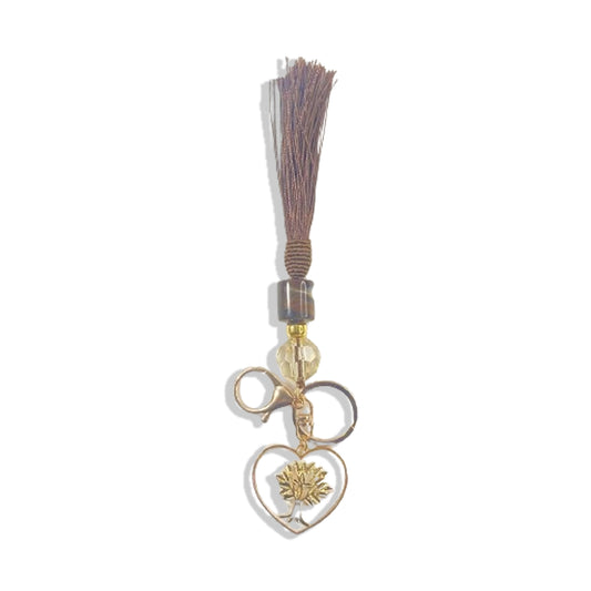 CHAVEIRO LUXO COM MOSQUETE ÁRVORE DA VIDA COM POMPOM MARROM (1 UNIDADE)