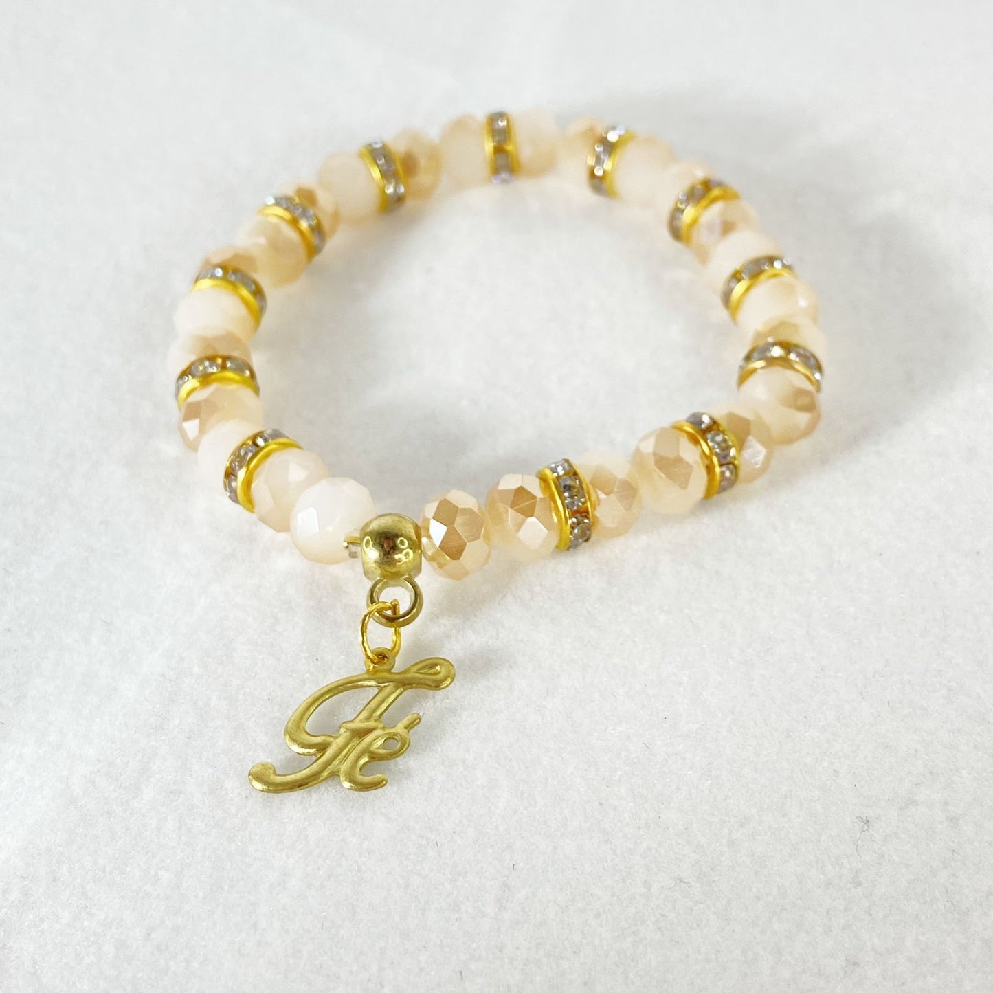 PULSEIRA CRISTAL FÉ CREME ( 3 UNIDADES)