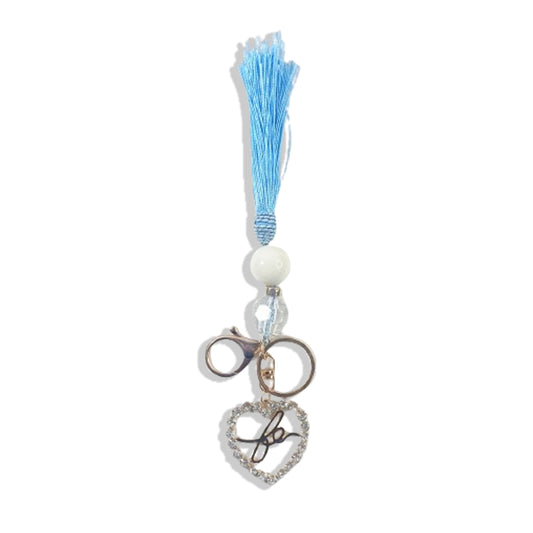 CHAVEIRO LUXO COM MOSQUETE FÉ CORAÇÃO COM POMPOM AZUL BEBÊ (1 UNIDADE)