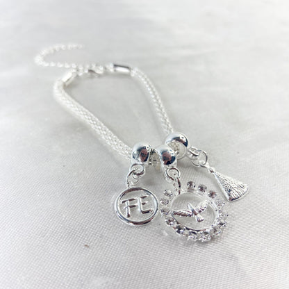 PULSEIRA NÍQUEL REDONDO DIVINO ESPIRITO SANTO COM STRASS BRANCO (6 UNIDADES)