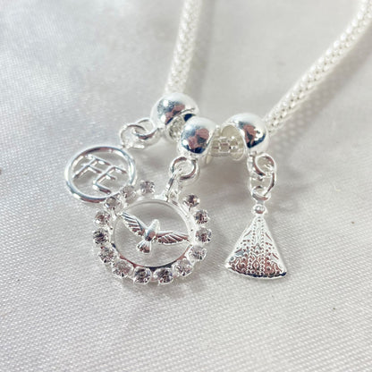 PULSEIRA NÍQUEL REDONDO DIVINO ESPIRITO SANTO COM STRASS BRANCO (6 UNIDADES)