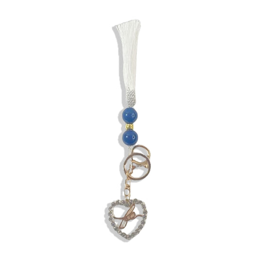 CHAVEIRO LUXO COM MOSQUETE FÉ CORAÇÃO COM POMPOM BRANCO (1 UNIDADE)