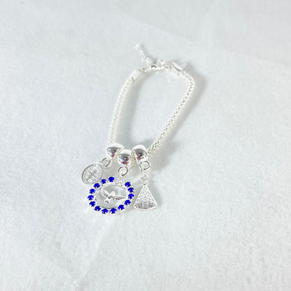 PULSEIRA NÍQUEL DIVINO ESPIRITO SANTO COM STRASS AZUL  (6 UNIDADES)
