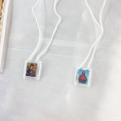 ESCAPULÁRIO CORDINHA NOSSA SENHORA DO PERPÉTUO SOCORRO E SAGRADO CORAÇÃO DE JESUS (12 UNIDADES)
