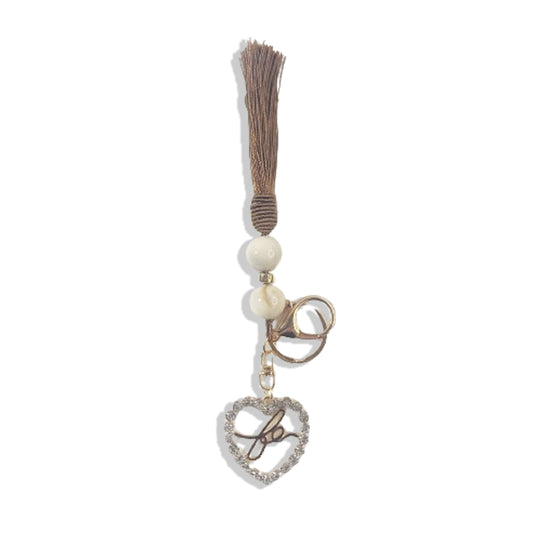CHAVEIRO LUXO COM MOSQUETE FÉ CORAÇÃO COM POMPOM MARROM (1 UNIDADE)